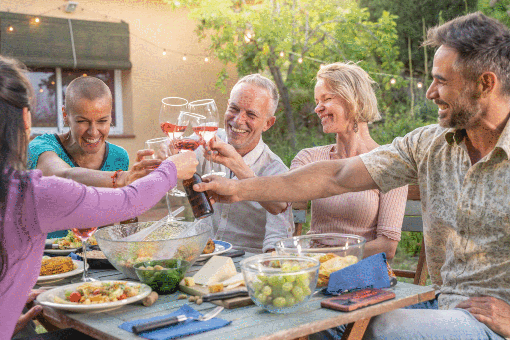 group of 50 something friend's outside enjoying drinks and dinner