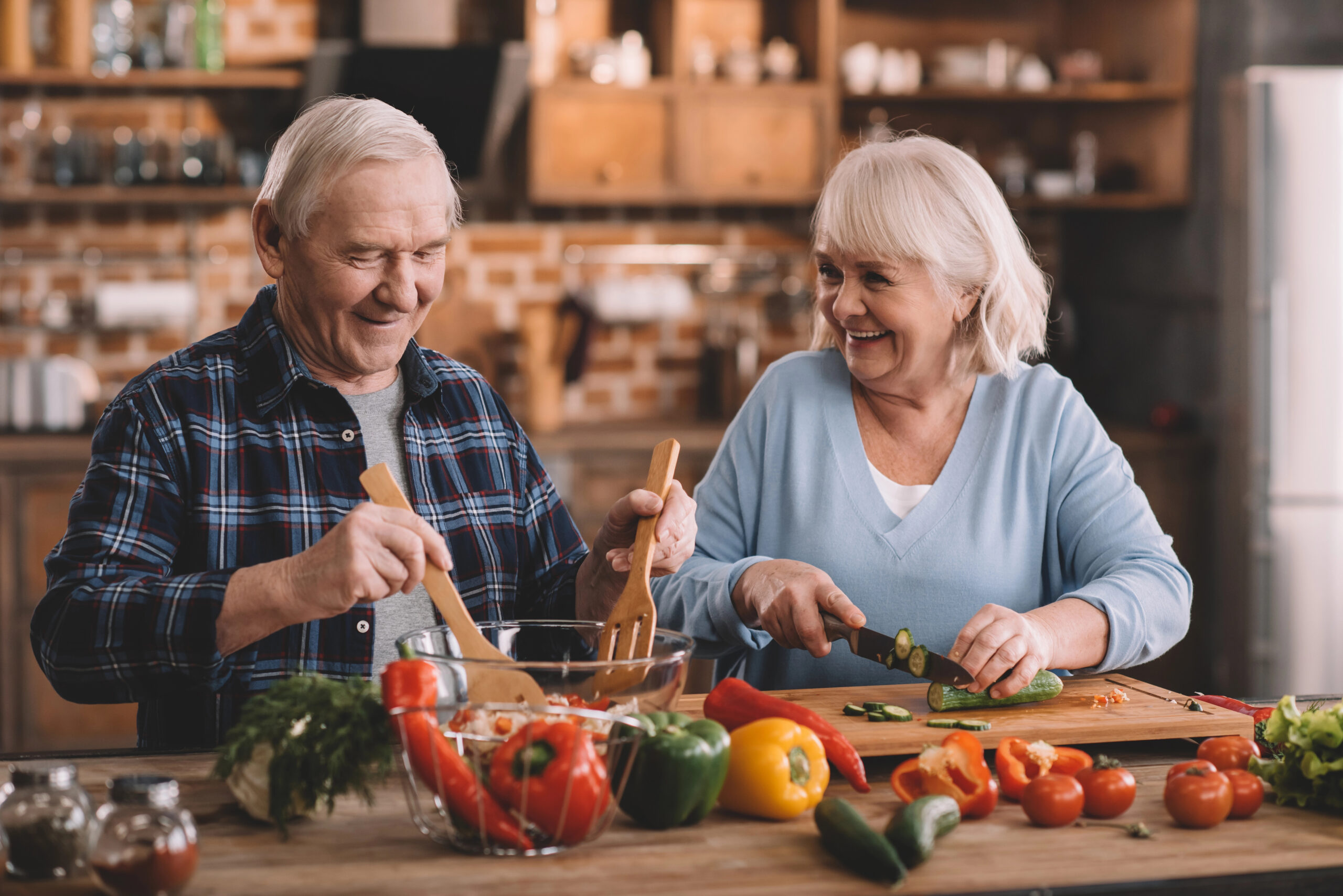 Happy Senior Couple Preparing Health Food