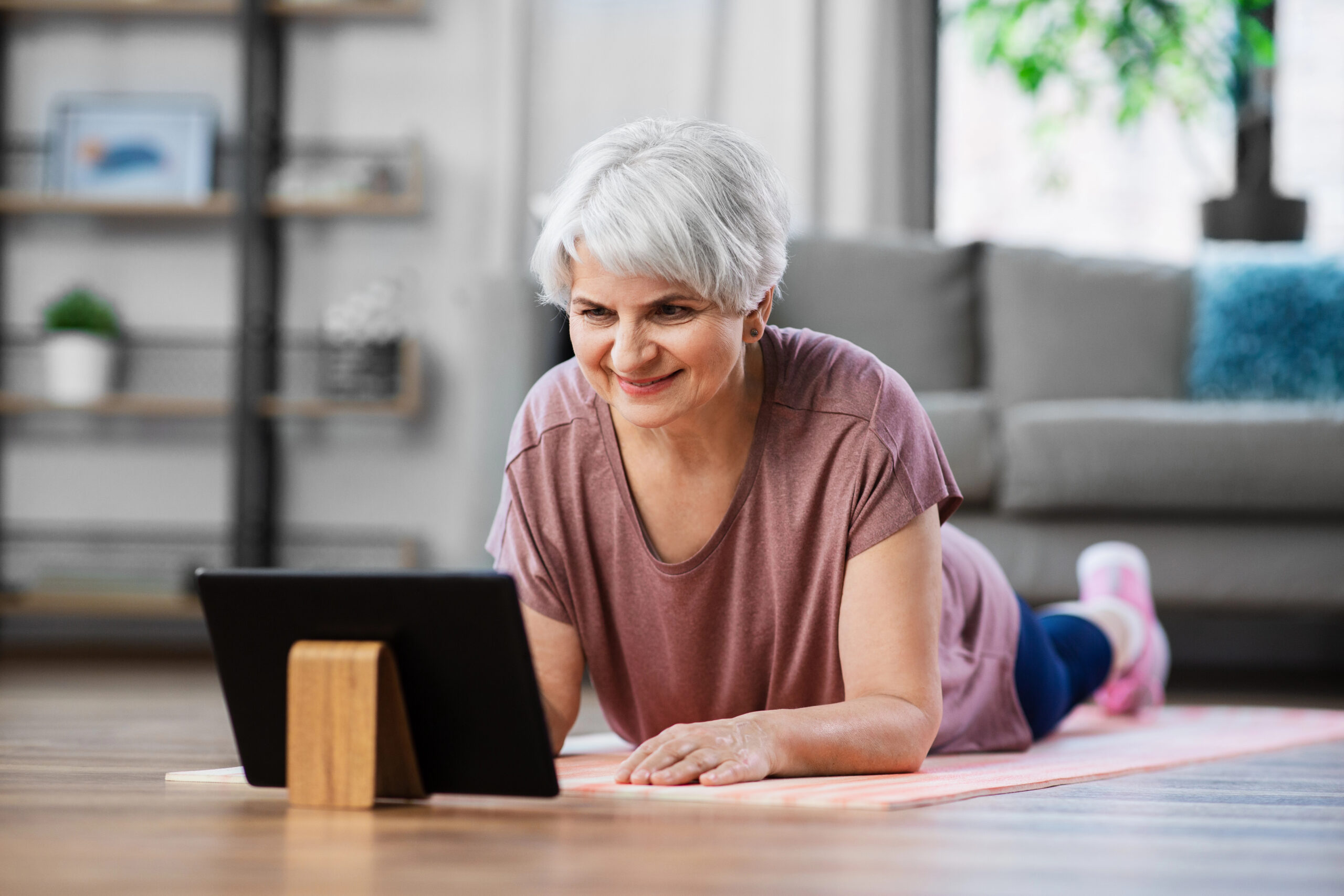 woman watching core balance training online training
