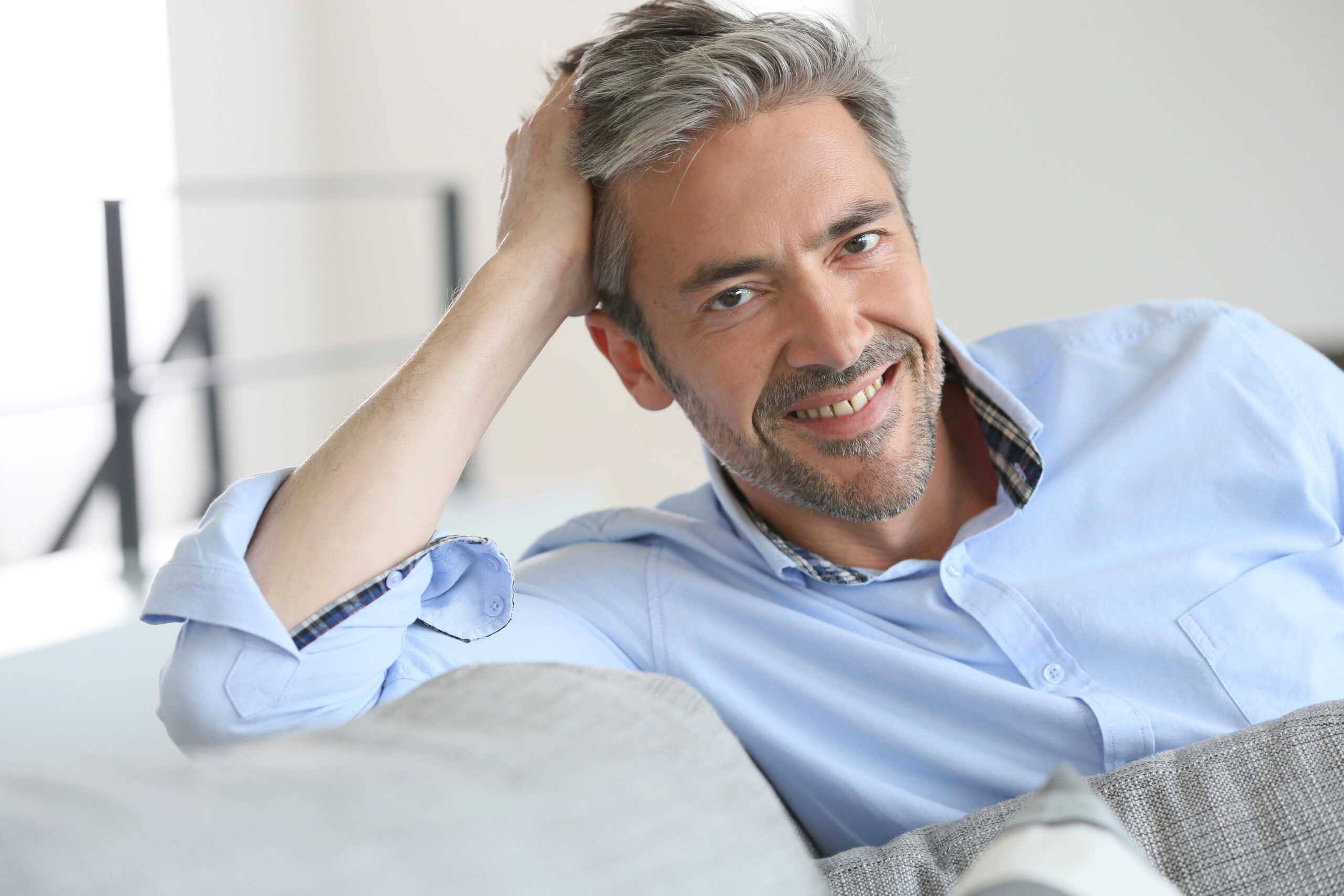 mature man looking more relaxed and happy 